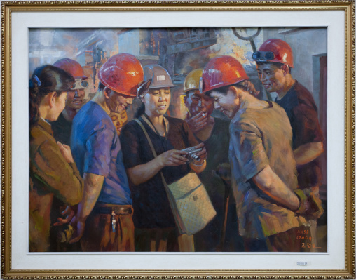 Painting in the Mansudae art studio depicting some workers looking at a digital camera, Pyongan Province, Pyongyang, North Korea