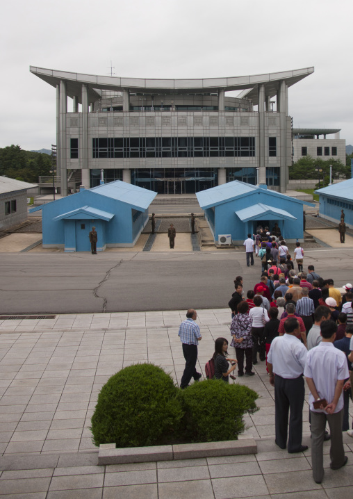 Tourists queueing to visit the conference room on the Demilitarized Zone, North Hwanghae Province, Panmunjom, North Korea