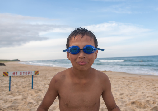 North Korean boy having fun at the beach, North Hamgyong Province, Chilbo Sea, North Korea