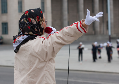 Young North Korean women during a mass games rehearsal in Kim il Sung square, Pyongan Province, Pyongyang, North Korea