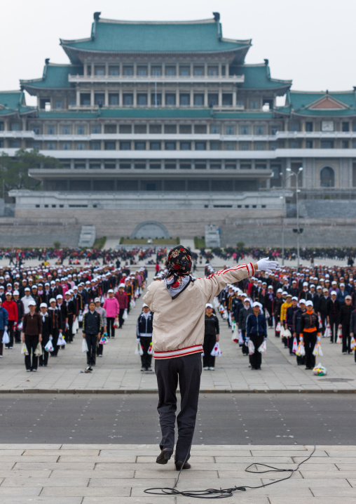 Young North Korean women during a mass games rehearsal in Kim il Sung square, Pyongan Province, Pyongyang, North Korea