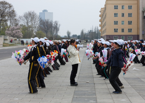 Young North Korean women during a mass games rehearsal in Kim il Sung square, Pyongan Province, Pyongyang, North Korea