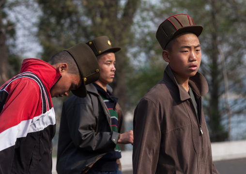 North Korean soldiers with a relaxed attitude in the street, Pyongan Province, Pyongyang, North Korea