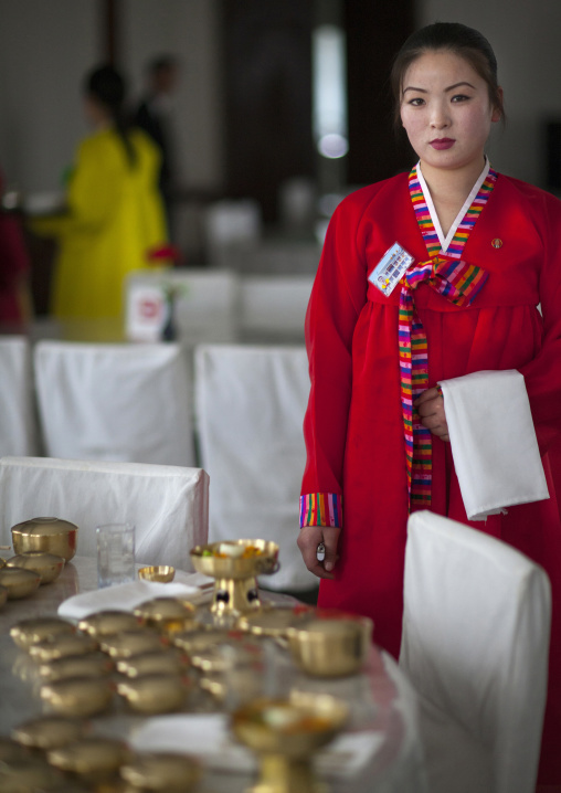 North Korean waitress in a Korean restaurant, Pyongan Province, Pyongyang, North Korea