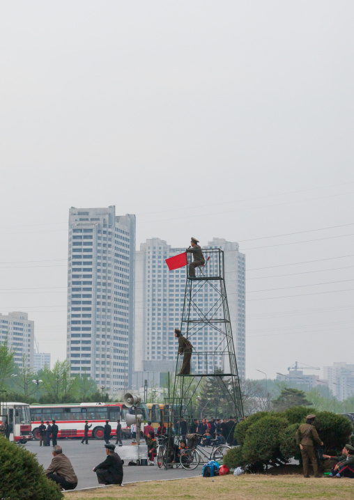 Military men monitoring a parade from a high chair, Pyongan Province, Pyongyang, North Korea