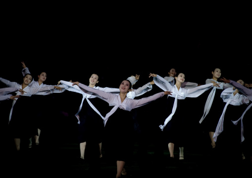 North Korean women dancing in choson-ot during the Arirang mass games in may day stadium, Pyongan Province, Pyongyang, North Korea