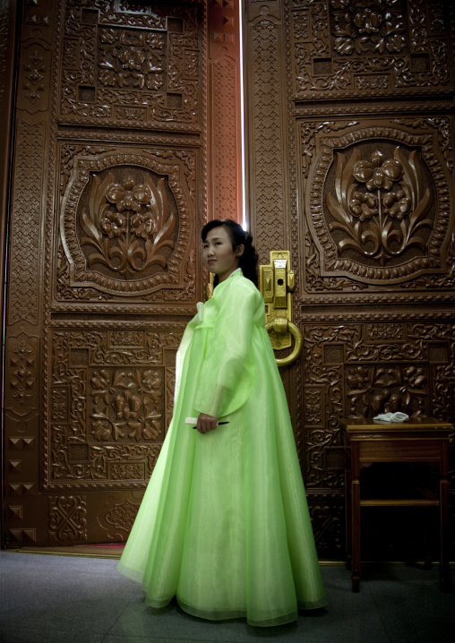 North Korean guide in front of the entrance of the international friendship exhibition, North Pyongan Province, Myohyang-san, North Korea