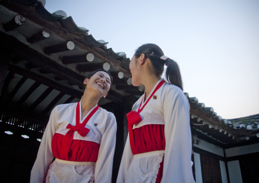 Laughing North Korean waitresses in choson-ot in a restaurant, North Hwanghae Province, Kaesong, North Korea