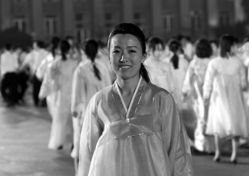 North Korean students dancing to celebrate april 15 the birth anniversary of Kim Il-sung on Kim il Sung square, Pyongan Province, Pyongyang, North Korea