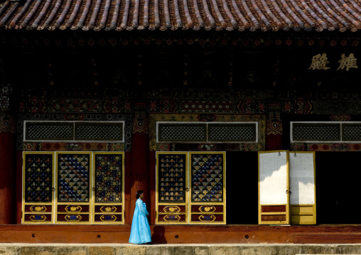 North Korean woman in choson-ot in front of Pohyon-sa Korean buddhist temple, Hyangsan county, Mount Myohyang, North Korea