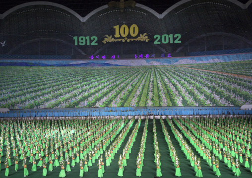 North Korean women dancing in choson-ot during the Arirang mass games in may day stadium, Pyongan Province, Pyongyang, North Korea