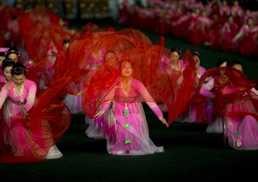 North Korean women dancing in choson-ot during the Arirang mass games in may day stadium, Pyongan Province, Pyongyang, North Korea