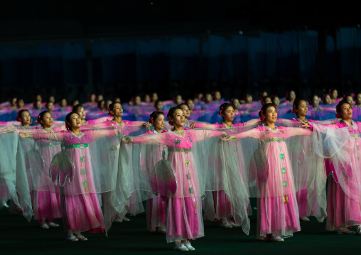 North Korean women dancing in choson-ot during the Arirang mass games in may day stadium, Pyongan Province, Pyongyang, North Korea