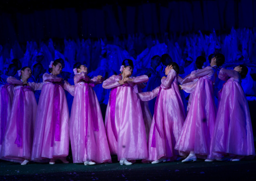 North Korean women dancing in choson-ot during the Arirang mass games in may day stadium, Pyongan Province, Pyongyang, North Korea