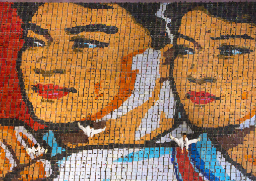 Taekwando fighters made by children pixels holding up colored boards during Arirang mass games in may day stadium, Pyongan Province, Pyongyang, North Korea