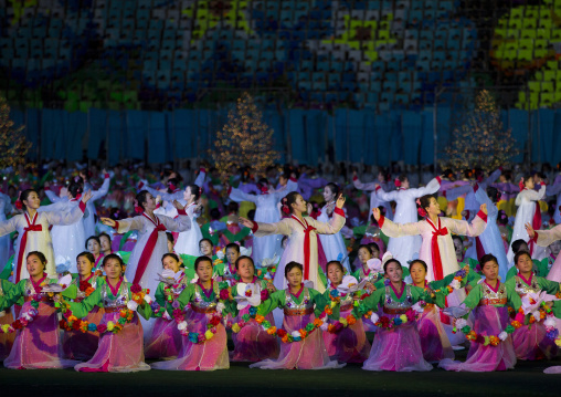 North Korean women dancing in choson-ot during the Arirang mass games in may day stadium, Pyongan Province, Pyongyang, North Korea