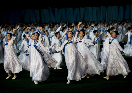 North Korean women dancing in choson-ot during the Arirang mass games in may day stadium, Pyongan Province, Pyongyang, North Korea