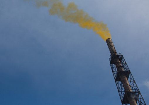 Yellow smoke coming out of a chimney in Hungnam nitrogen fertilizer plant, South Hamgyong Province, Hamhung, North Korea