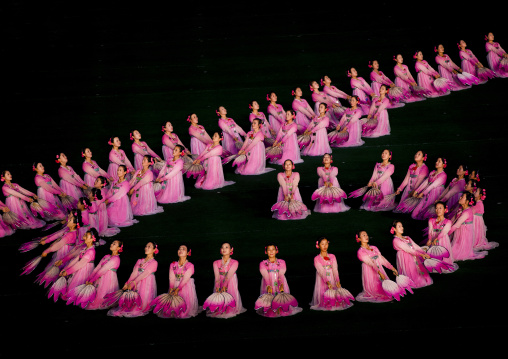 North Korean women dancing in choson-ot during the Arirang mass games in may day stadium, Pyongan Province, Pyongyang, North Korea