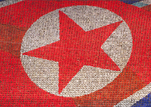 North Korean flag made by human pixels holding up colored boards during Arirang mass games in may day stadium, Pyongan Province, Pyongyang, North Korea