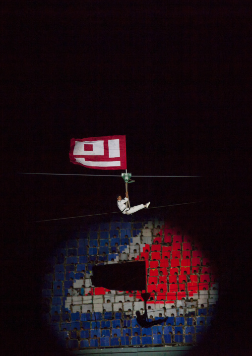 North Korean man cossing the sky during the Arirang mass games in may day stadium, Pyongan Province, Pyongyang, North Korea