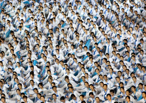 North Korean women dancing in choson-ot during the Arirang mass games in may day stadium, Pyongan Province, Pyongyang, North Korea