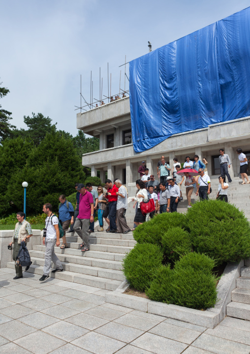 Tourists queueing to visit the conference room on the Demilitarized Zone, North Hwanghae Province, Panmunjom, North Korea