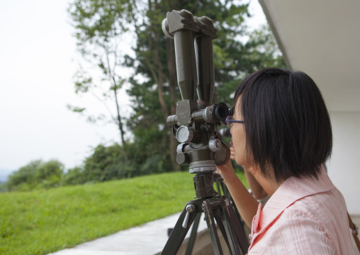 North Korean guide looking at south Korea from the wall section of the Demilitarized Zone, North Hwanghae Province, Panmunjom, North Korea