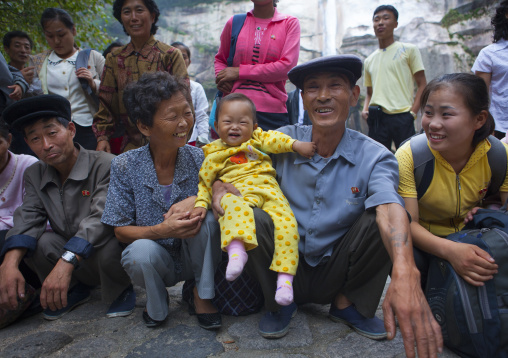 North Korean people posing for a picture in a park, North Hwanghae Province, Kaesong, North Korea