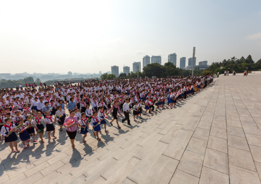 North Korean pioneers from the Korean children's union in the Grand monument on Mansu hill, Pyongan Province, Pyongyang, North Korea