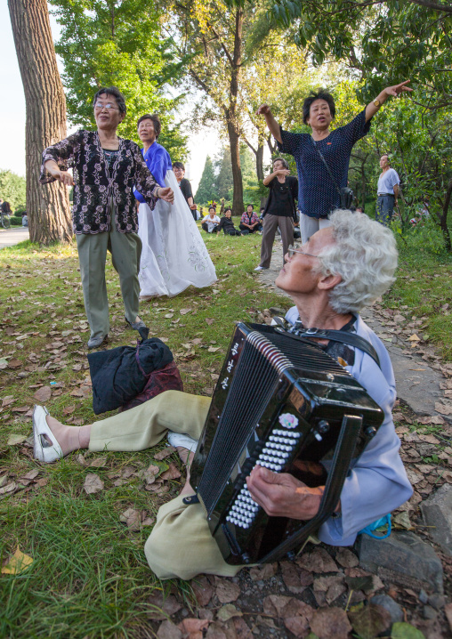 North Korean having fun in a park on national day, Pyongan Province, Pyongyang, North Korea