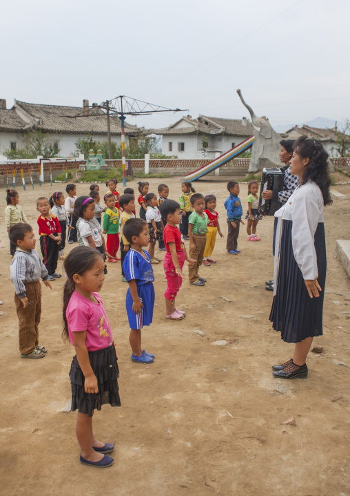 North Korean children making morning gymnastics at school, South Hamgyong Province, Hamhung, North Korea