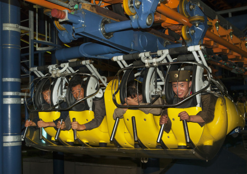 North Korean soldiers in a fairground attraction at Kaeson youth park, Pyongan Province, Pyongyang, North Korea