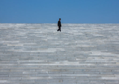 North Korean man going to Taesongsan revolutionary martyr's cemetery, Pyongan Province, Pyongyang, North Korea