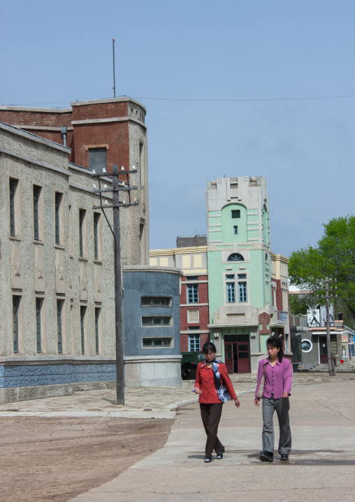 North Korean women walking in the Pyongyang film studio, Pyongan Province, Pyongyang, North Korea