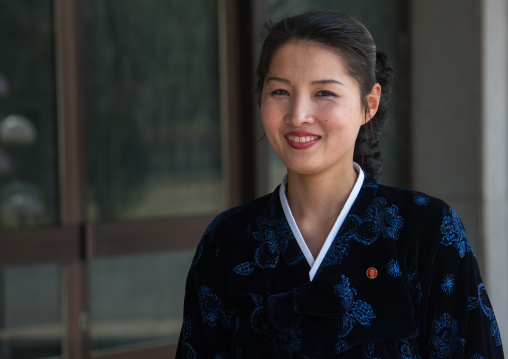 Portrait of a smiling North Korean woman, Pyongan Province, Pyongyang, North Korea