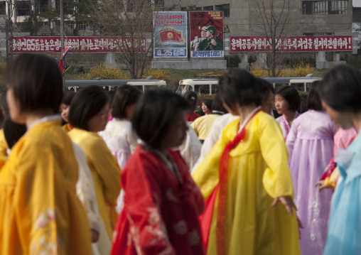 North Korean young adults during a mass dance performance in front of buildings on military foundation day, Pyongan Province, Pyongyang, North Korea