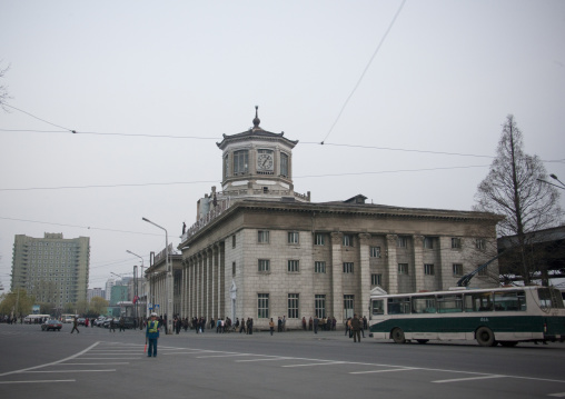 North Korean male traffic security officer in blue uniform in the street, Pyongan Province, Pyongyang, North Korea