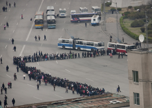 Crowd of North Korean people queueing in line for a bus
, Pyongan Province, Pyongyang, North Korea