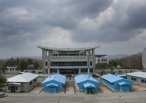 North Korean soldiers standing in front of the United Nations conference rooms on the demarcation line in the Demilitarized Zone, North Hwanghae Province, Panmunjom, North Korea