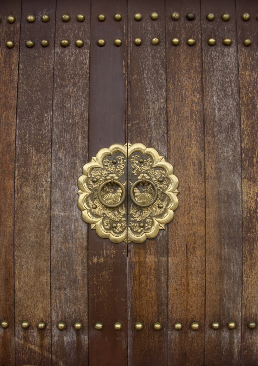 Old wooden door in Ryongthong temple founded by Korean chonthae sect of buddhism, Ogwansan, Ryongthong Valley, North Korea