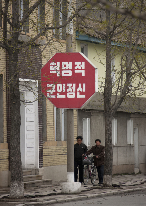 North Korean people walking in a street in the old town, North Hwanghae Province, Kaesong, North Korea