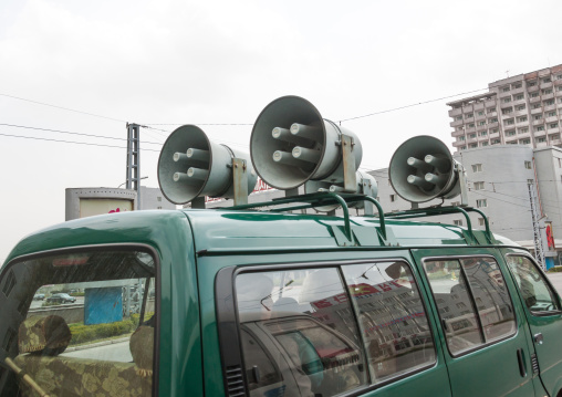 Propaganda car with loudspeakers on the roof in the street, Pyongan Province, Pyongyang, North Korea