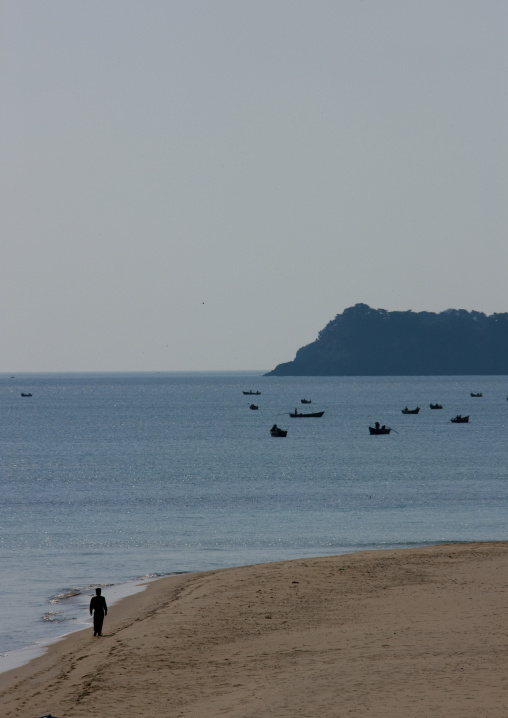 North Korean soldier walking on a beach, Kangwon Province, Wonsan, North Korea