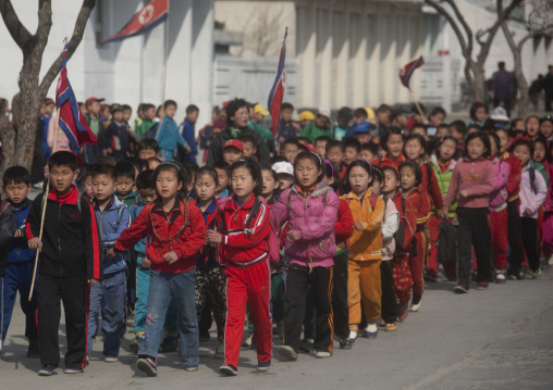 North Korean children parading in the streets on the international workers' day, Kangwon Province, Wonsan, North Korea