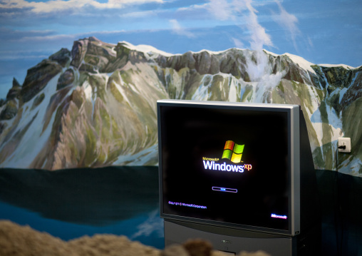 Windows computer in front of mountain decor of mount Paektu, Ryanggang Province, Samjiyon, North Korea