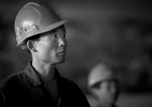 North Korean workers in a steel factory, South Pyongan Province, Nampo, North Korea