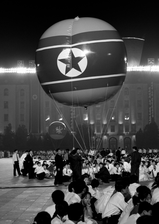 North Korean students dancing to celebrate april 15 the birth anniversary of Kim Il-sung on Kim il Sung square, Pyongan Province, Pyongyang, North Korea