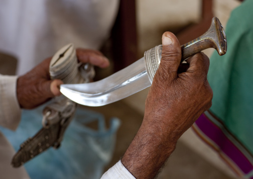 Man Checking A Khanjar, Sinaw, Oman