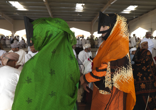 Two Bedouin Women In Colourful Burqa, Sinaw Fish Market, Oman